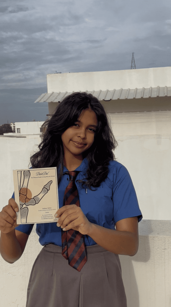 Aishani with the book